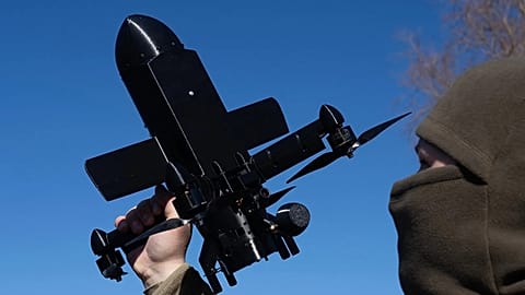 An instructor from the Ukrainian company General Cherry demonstrates the operation of an anti-air interceptor drone in the Kyiv region, 11 March, 2026