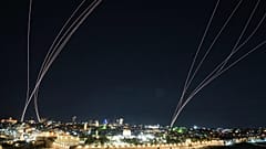 Israeli air defence system fires to intercept missiles launched from Iran toward Israel over Jerusalem, 1 March, 2026