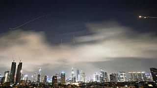 Israeli air defence system fires to intercept missiles during an Iranian attack over Tel Aviv, 15 March, 2026