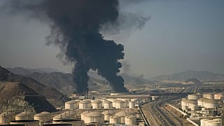 Fire and plumes of smoke rise from an oil facility in Fujairah, United Arab Emirates, Saturday, March 14, 2026. 
