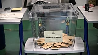 Ballots inside a box at a polling station during the first round of the municipal elections in Paris, 15 March, 2026
