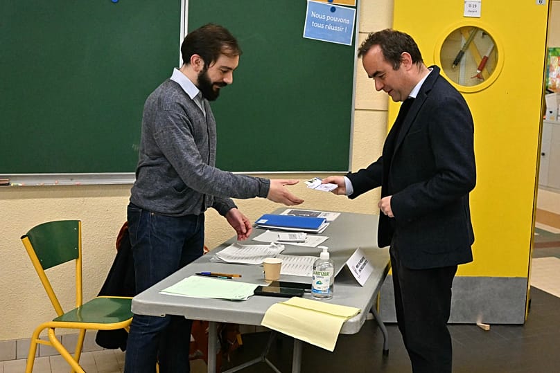 France's Prime Minister Sébastien Lecornu casts his vote during the first round of France's 2026 municipal elections in Vernon, 15 March, 2026