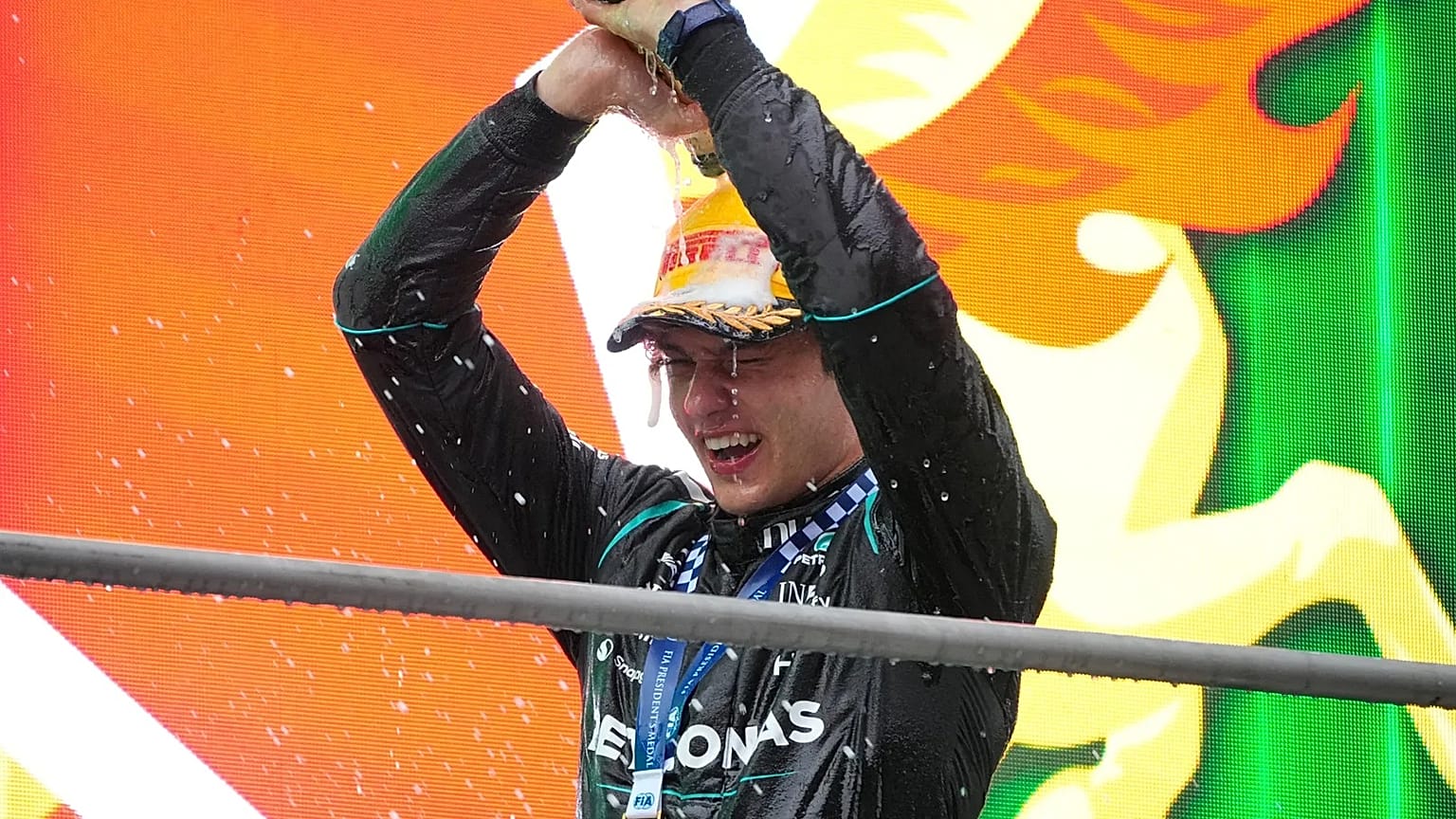 Andrea Kimi Antonelli of Italy pours champagne on himself at the Shanghai International Circuit in Shanghai, 15 March, 2026