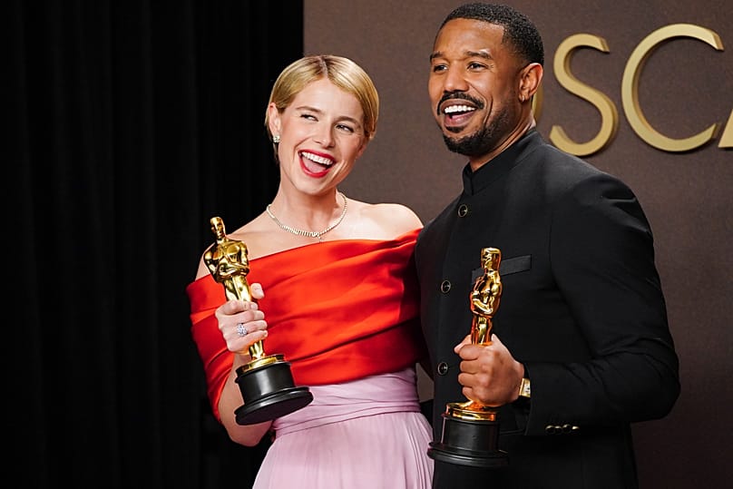 Jessie Buckley and Michael B. Jordan celebrating