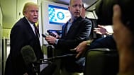 US President Donald Trump speaks to reporters aboard Air Force One, 15 March 2026