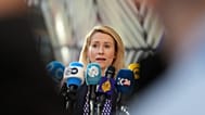 European Union foreign policy chief Kaja Kallas speaks with the media as she arrives for a meeting of EU foreign ministers at the European Council building in Brussels, Monday