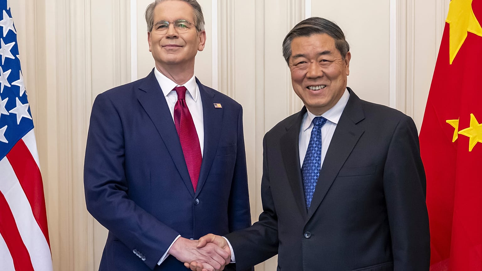 FILE. US Secretary of the Treasury Scott Bessent shakes hands with Chinese Vice Premier He Lifeng during a bilateral meeting  in Geneva, Switzerland, May 2025