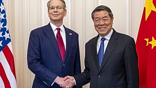 FILE. US Secretary of the Treasury Scott Bessent shakes hands with Chinese Vice Premier He Lifeng during a bilateral meeting  in Geneva, Switzerland, May 2025