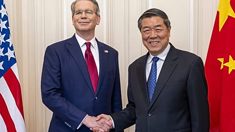 FILE. US Secretary of the Treasury Scott Bessent shakes hands with Chinese Vice Premier He Lifeng during a bilateral meeting  in Geneva, Switzerland, May 2025