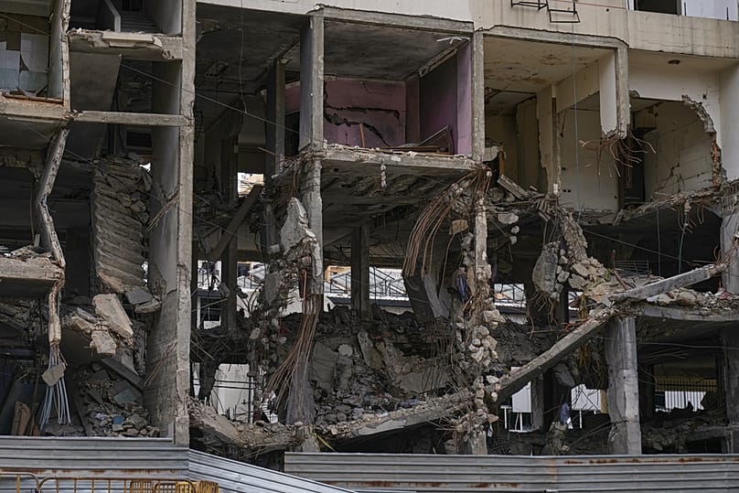 A view of a building damaged in an Israeli airstrike, in Dahiyeh, Beirut's southern suburbs, Beirut's southern suburbs, Lebanon, Monday, March 16, 2026