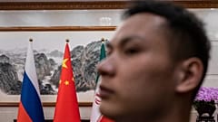 أعلام ايران والصين وروسيا