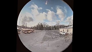This image made from video shows video taken from a surveillance camera showing a suspected meteor falling through the sky in Olmsted Falls, Ohio,