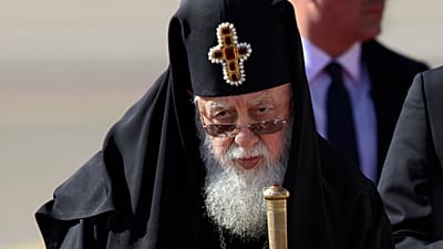 Georgian Orthodox Patriarch Ilia II, listens to the national anthem during a welcoming ceremony for Pope Francis in Tbilisi, Georgia, 30 September 2016.
