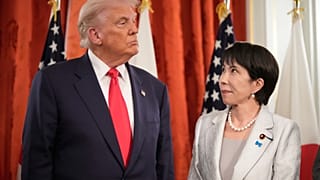 Japan's Prime Minister Sanae Takaichi looks to President Donald Trump as they meet at Akasaka Palace in Tokyo, Oct. 28, 2025.(AP Photo/Mark Schiefelbein)