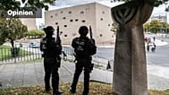 Police officers secure a synagogue in Dresden, Germany, Wednesday, Oct. 9, 2019