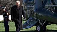 US President Donald Trump walks on the South Lawn as he returns to the White House, Wednesday, March 18, 2026, in Washington