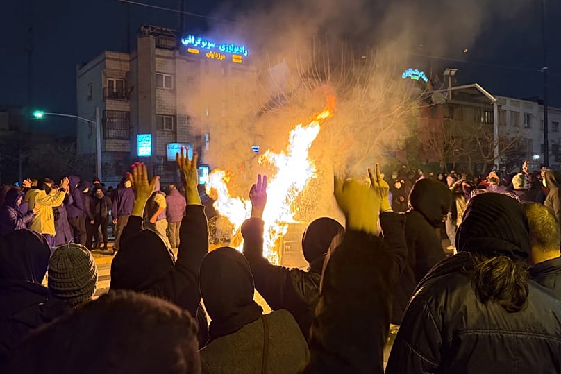 Iranians attend an anti-government protest in Tehran, 9 January, 2026