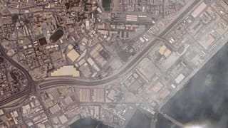 Immagine satellitare fornita da Planet Labs PBC mostra i danni causati dall'attacco iraniano al quartier generale della Quinta Flotta della Marina Usa in Bahrain