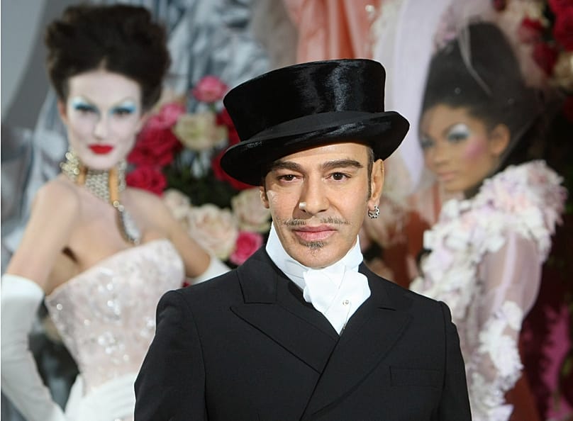 FILE: John Galliano poses at the end of the presentation of the Dior Haute Couture spring/summer 2010 fashion collection in Paris.
