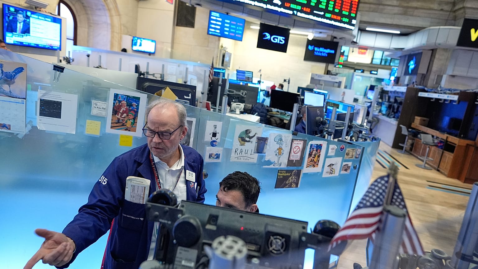 David O'Day, left, works on the floor at the New York Stock Exchange in New York. 18 March 2026. 