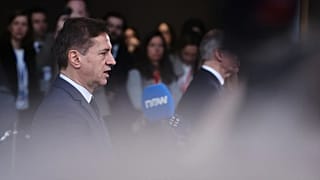 Slovenia's Prime Minister Robert Golob speaks with the media at the European Council building in Brussels, 19 March, 2026