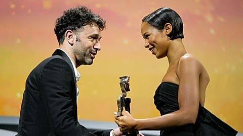 FILE: Rodrigo Sorogoyen presents Taylor Russell with the Marcello Mastroianni Award for Best Young Actress for 'Bones and All' at the 79th Venice Film Festival.