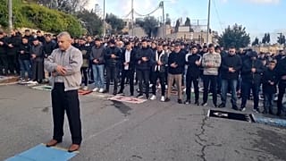 Tear gas and tension in Jerusalem as Eid prayers held outside al Aqsa