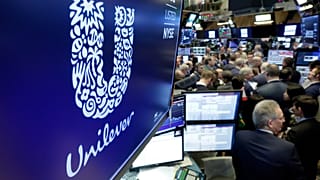 File - 2018 file photo, showing the logo for Unilever appears above a trading post on the floor of the New York Stock Exchange.  15 March 2018