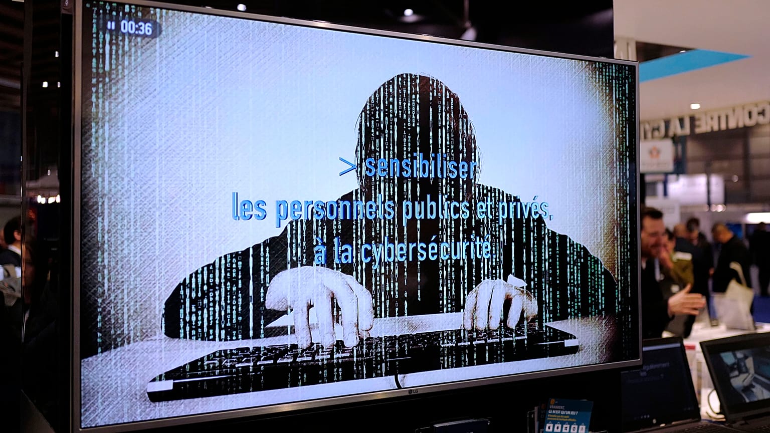 A television screen reads "Alerting public organizations and people to cybersecurity" at the International Cybersecurity forum in Lille, northern France,on Jan. 23, 2018.