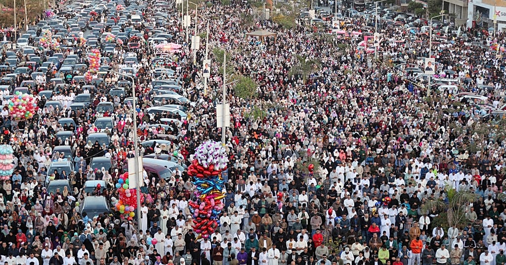 Egyptians attend prayers at a mosque to mark Eid celebrations