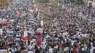 Egyptians attend prayers at a mosque to mark Eid celebrations