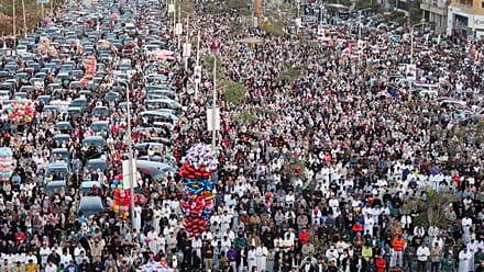 Egyptians attend prayers at a mosque to mark Eid celebrations