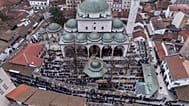 Muslims celebrate Eid al-Fitr in front of the Gazi Husref Beg Mosque in Sarajevo.