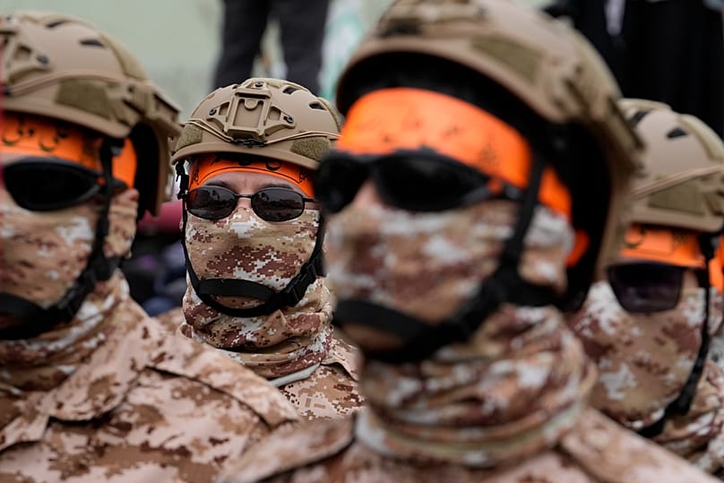 Member of the Basij paramilitary force attend a rally in Tehran, 28 March, 2025