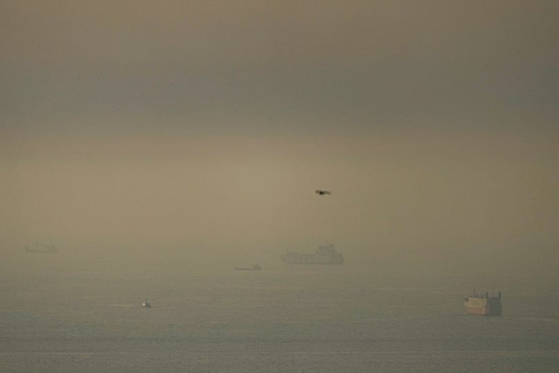 Cargo ships sail in the Arabian Gulf towards Strait of Hormuz in United Arab Emirates, Thursday, March 19, 2026.
