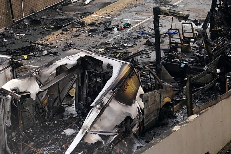 View at burnt Ambulances in a car park at Golders Green in London, Monday, March 23, 2026 after an apparent arson attack on four Jewish ambulance vehicles.