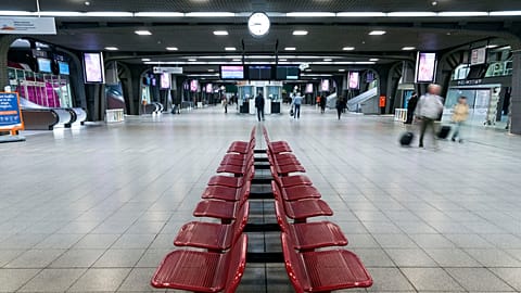 Passengers walk through a quiet Brussels Midi Station during a train strike on Wednesday, April 22, 2015. 