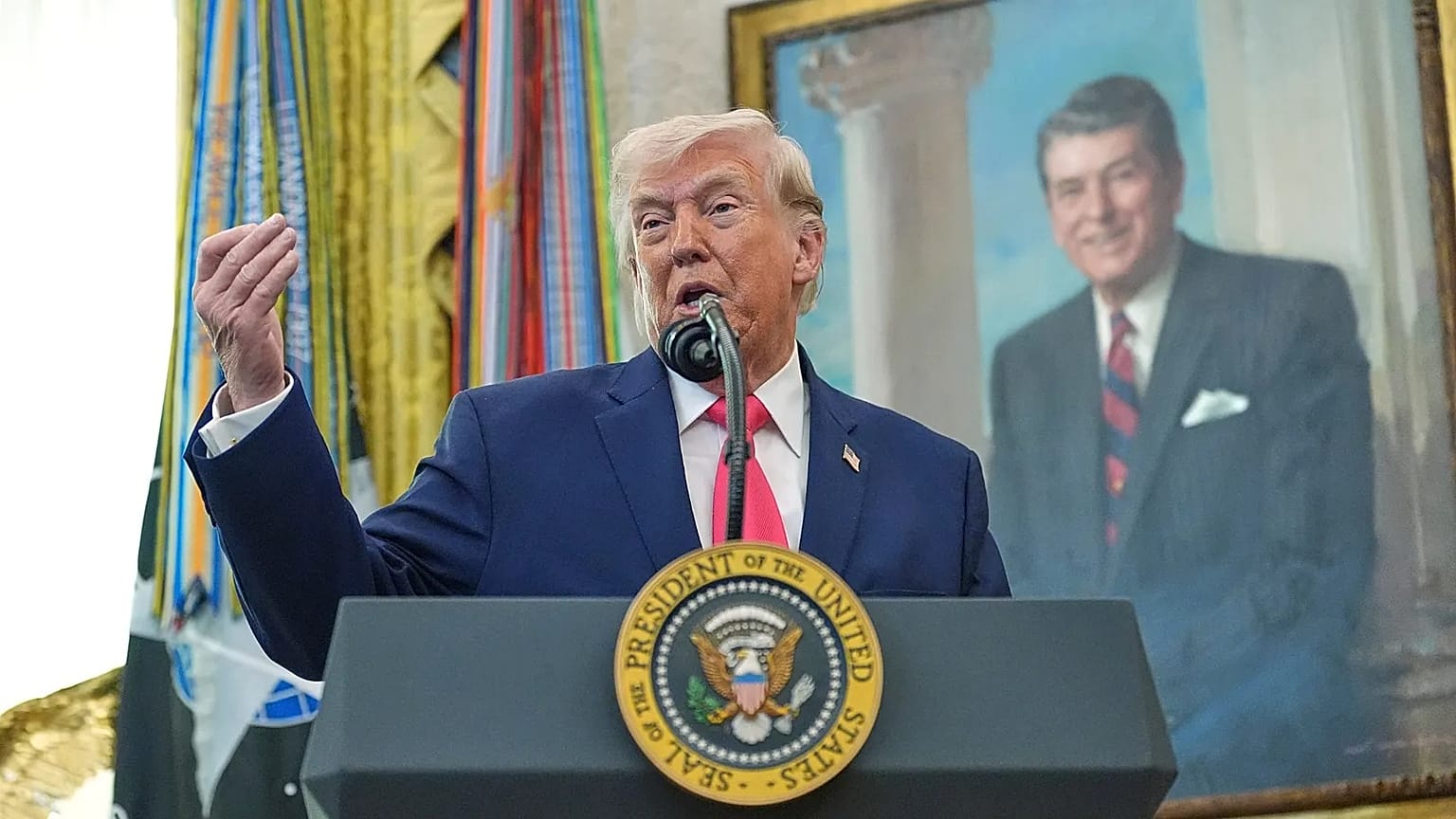 US President Donald Trump speaks during the swearing in for Homeland Security Secretary Markwayne Mullin in the Oval Office of the White House, 24 March, 2026