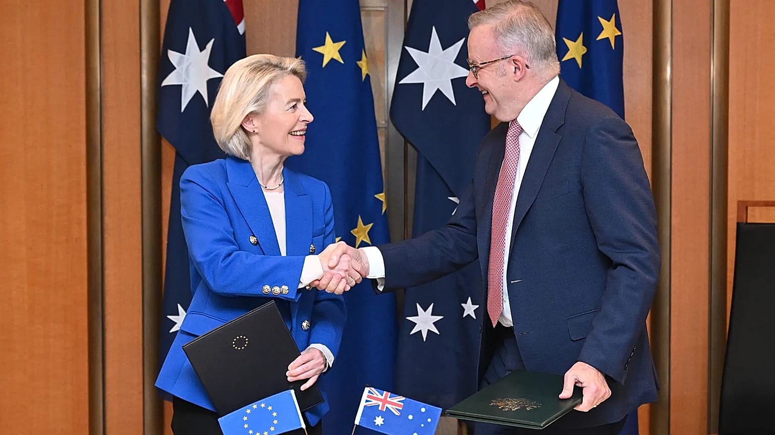 EU Commission President Ursula von der Leyen and Australian Prime Minister Anthony Albanese sign a joint statement in Canberra, Tuesday, March 24, 2026.