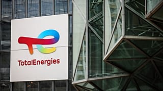 FILE - A sign for the French company TotalEnergies is displayed at headquarters March 21, 2025, in La Defense business district outside of Paris. 