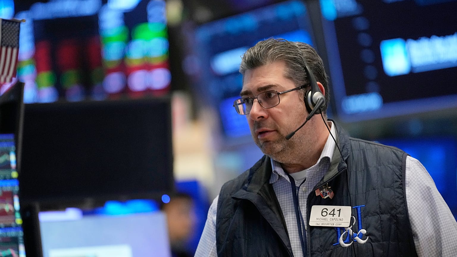 Michael Capolino works on the floor at the New York Stock Exchange, 19 March 2026