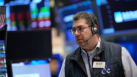 Michael Capolino works on the floor at the New York Stock Exchange, 19 March 2026