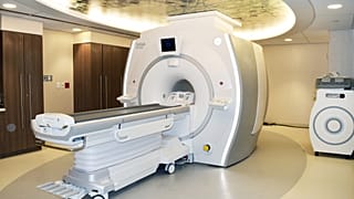 An MRI scanner used in medical imaging, which relies on liquid helium to operate.
