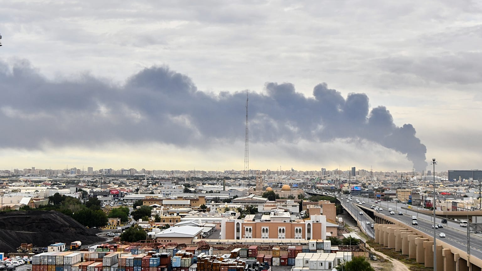 Smoke rises from Kuwait international airport after a drone strike on fuel storage in Kuwait City, 25 March 2026