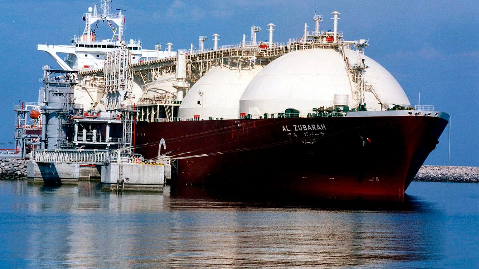 This undated file photo shows a Qatari liquid natural gas (LNG) tanker ship being loaded up with LNG, made up mainly of methane, at Raslaffans Sea Port, northern Qatar.