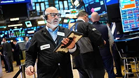 Federico DeMarco works on the floor at the New York Stock Exchange, 25 March 2026
