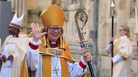 Sarah Mullally waves as she leaves after the Enthronement Ceremony installing her as archbishop of Canterbury in Canterbury, 25 March, 2026