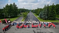 About 400 children from the city club "Summer of Victories" line up to compose the word "Russia" Russia at the World War II Museum in Moscow, Russia, June 12, 2024