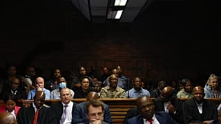 South Africa: 12 police officers charged with corruption appear in court