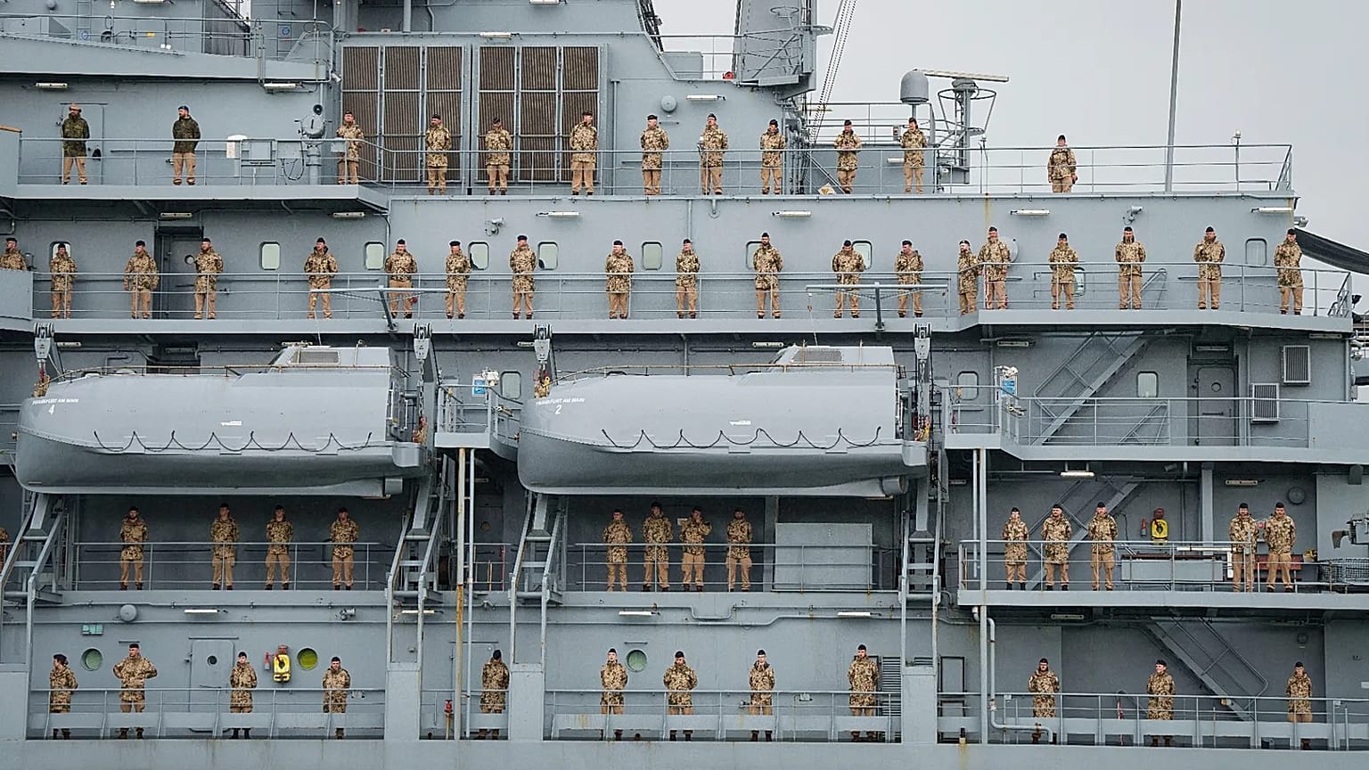 FILE: German Navy personnel stand in position on combat supply ship FGS Frankfurt am Main as it arrives at port Klang in Kuala Lumpur, 15 October 2024